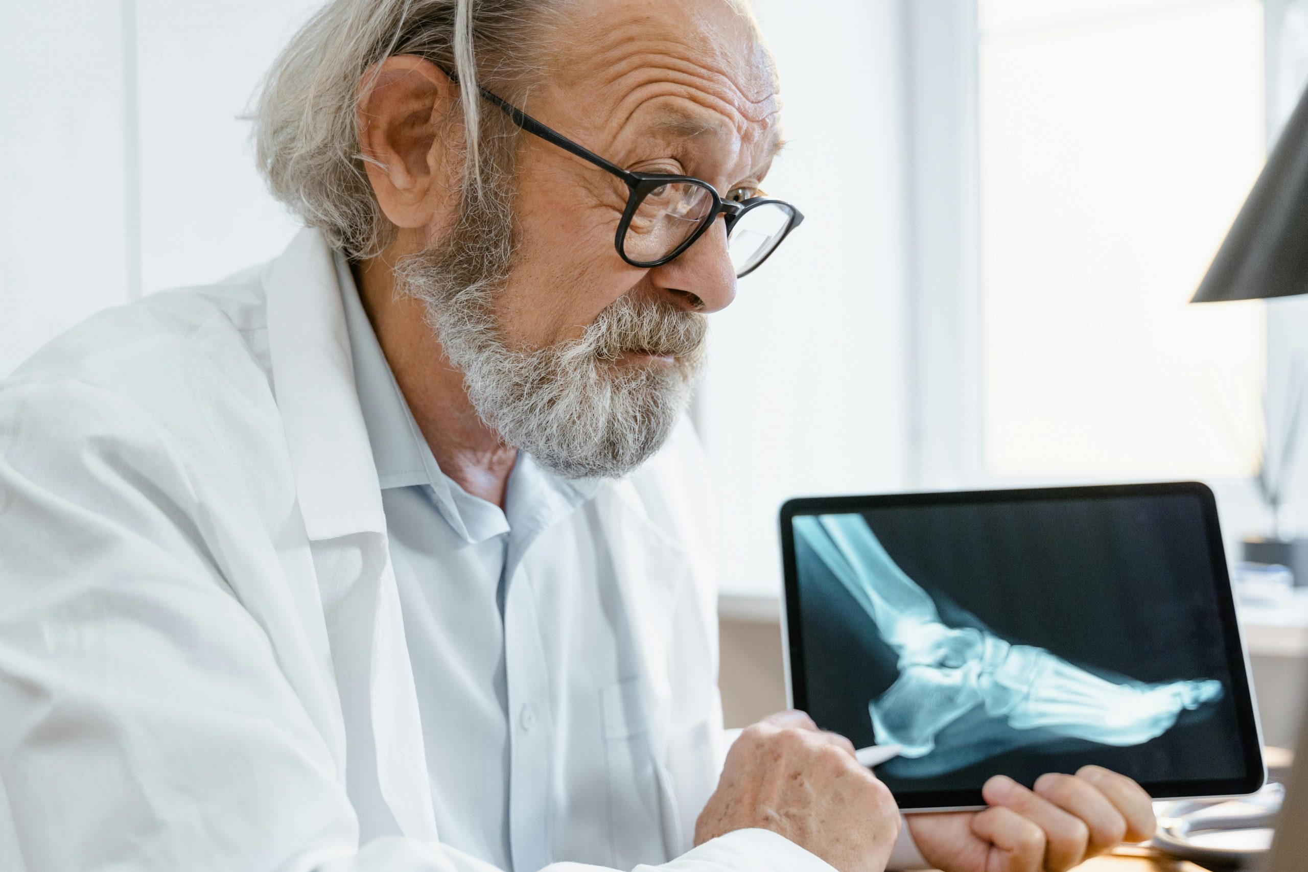 Orthopaedic physician leveraging a QME management company to handle administrative and compliance tasks efficiently.