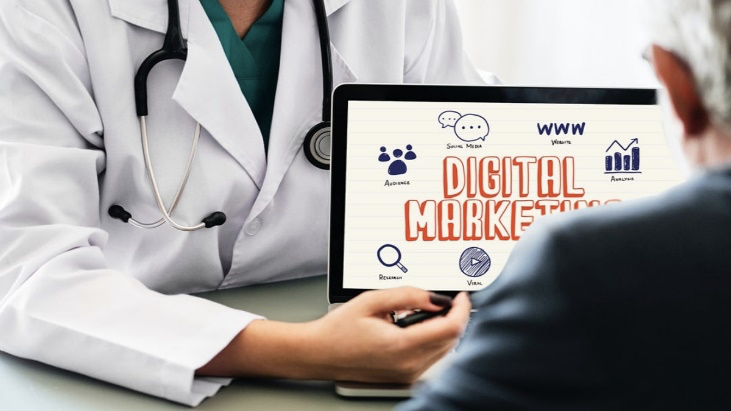 Medical professional presenting a tablet displaying a 'Digital Marketing' graphic, emphasizing strategies like targeted outreach and social media engagement to grow a QME practice.